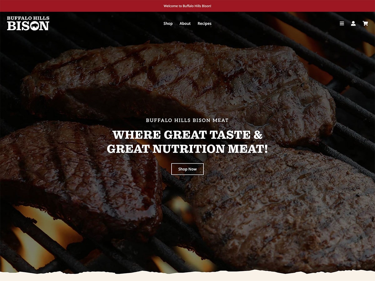 Grilled buffalo hills bison steaks cooking on a barbecue grill.